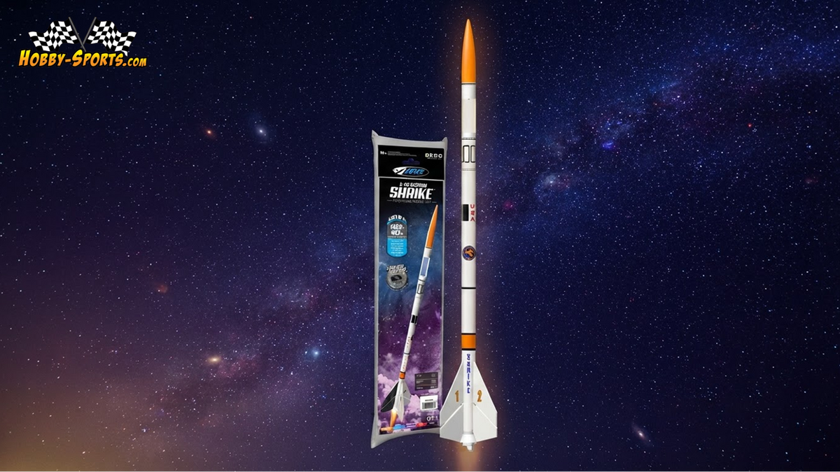 Estes Shrike model rocket with orange and white body standing upright against a starry night sky background.